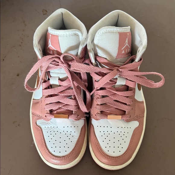 Nike air Jordan 1 Mid Pink and White High Top Sneakers with rose gold detailing